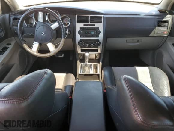 2006 Dodge Charger SRT-8 with VIN 2B3KA73W86H369838, listed as a Copart auction lot 52767384 with 165,630 mi miles and Salvage title. Bid and sale history available at DreamBid. Image 8.