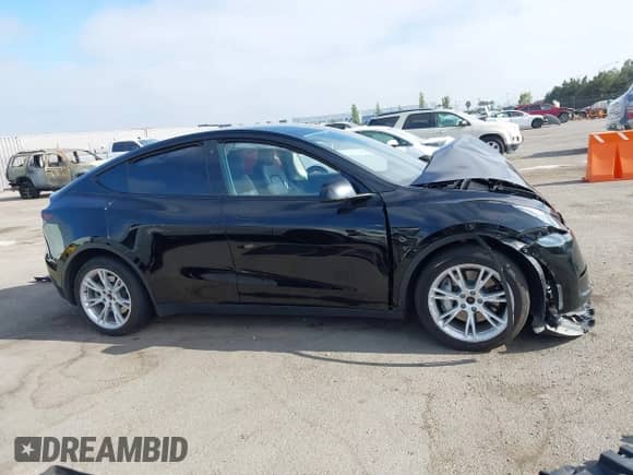 2023 Tesla Model Y Long Range с VIN 7SAYGAEE1PF594220, выставлен на аукционе IAAI как лот 42885301 с пробегом 94 878 миль миль и . История ставок и продаж доступна на DreamBid. Изображение 14.