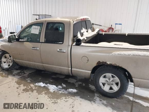2003 Dodge RAM with VIN 1D3HA18N83J536402, listed as a IAAI auction lot 41282168 with 261,665 mi miles and . Bid and sale history available at DreamBid. Image 14.