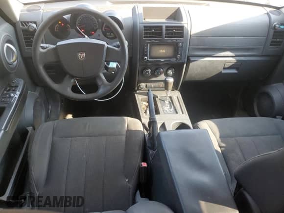 2011 Dodge Nitro Heat with VIN 1D4PT4GX7BW500594, listed as a Copart auction lot 80340385 with 216,634 mi miles and Salvage title. Bid and sale history available at DreamBid. Image 8.