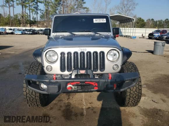 2016 Jeep Wrangler Rubicon with VIN 1C4BJWCG0GL170403, listed as a Copart auction lot 44132165 with 124,557 mi miles and Salvage title. Bid and sale history available at DreamBid. Image 5.