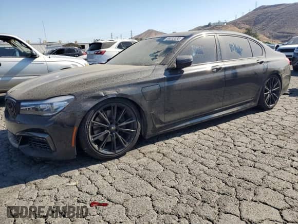2017 BMW 7 Series 740e xDrive with VIN WBA7J2C39HG497904, listed as a Copart auction lot 66635585 with 161,992 mi miles and Clean title. Bid and sale history available at DreamBid. Image 1.