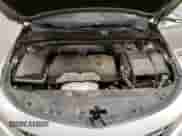 2014 Chevrolet Impala LTZ with VIN 1G1145SL9EU138853, listed as a Copart auction lot 90234735 with 181,122 mi miles and Salvage title. Bid and sale history available at DreamBid. Image 11.