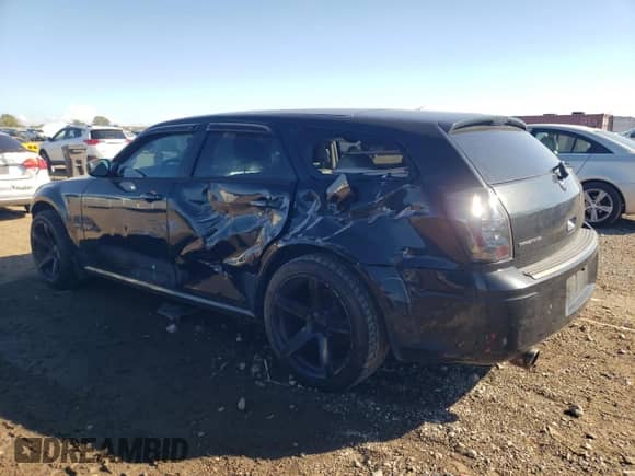 2005 Dodge Magnum RT with VIN 2D4GV58215H587205, listed as a Copart auction lot 72400054 with 115,534 mi miles and Salvage title. Bid and sale history available at DreamBid. Image 2.