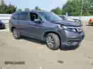 2022 Honda Pilot EX-L with VIN 5FNYF6H58NB020414, listed as a Copart auction lot 67414035 with 68,792 mi miles and Salvage title. Bid and sale history available at DreamBid. Image 4.