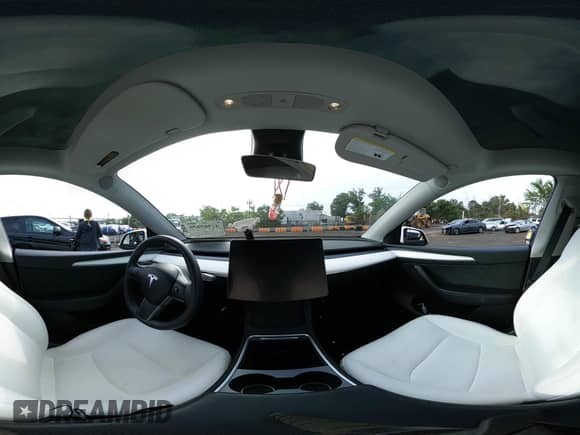 2023 Tesla Model Y Long Range with VIN 7SAYGDEE5PF633389, listed as a IAAI auction lot 42969850 with 16,889 mi miles and . Bid and sale history available at DreamBid. Image 17.