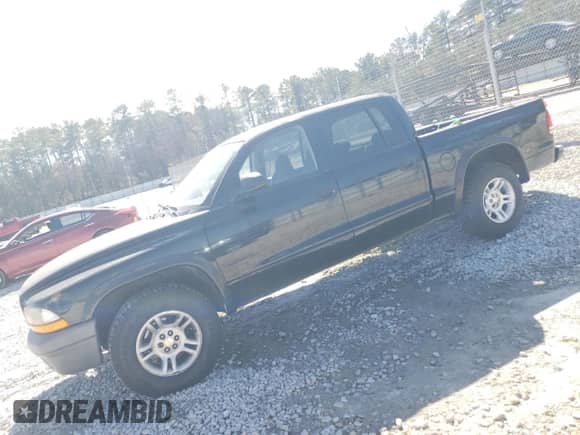 2003 Dodge Dakota Sport with VIN 1D7HL38X13S358851, listed as a Copart auction lot 46395655 with 219,125 mi miles and Salvage title. Bid and sale history available at DreamBid. Image 1.