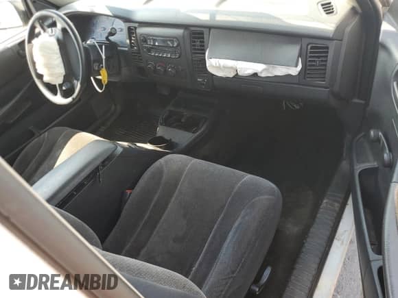 2002 Dodge Dakota с VIN 1B7GL12X72S690701, выставлен на аукционе Copart как лот 62176795 с пробегом 217 197 миль миль и Списание • Salvage title. История ставок и продаж доступна на DreamBid. Изображение 8.