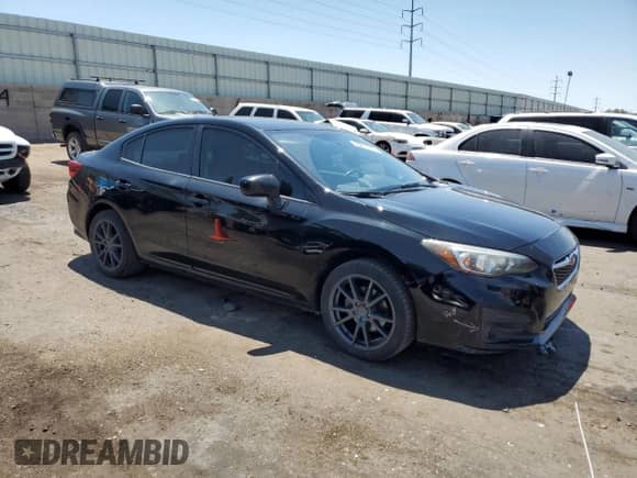 2017 Subaru Impreza Premium with VIN 4S3GKAD65H3613979, listed as a Copart auction lot 65837935 with 82,361 mi miles and Salvage title. Bid and sale history available at DreamBid. Image 4.