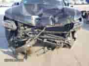 2024 Cadillac Escalade with VIN 1GYS4PKT3RR207675, listed as a Copart auction lot 77889674 with 34,951 mi miles and Salvage title. Bid and sale history available at DreamBid. Image 12.