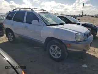 2001 Hyundai Santa Fe GLS с VIN KM8SC83D91U048535, выставлен на аукционе Copart как лот 85041184 с пробегом 218 621 миль миль и Списание • Salvage title. История ставок и продаж доступна на DreamBid. Изображение 4.