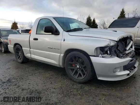 2005 Dodge RAM with VIN 3D7HA16H45G776899, listed as a Copart auction lot 84743434 with 125,102 mi miles and Salvage title. Bid and sale history available at DreamBid. Image 4.