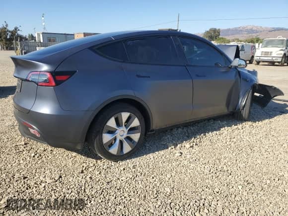 2023 Tesla Model Y Long Range with VIN 7SAYGAEE5PF903588, listed as a Copart auction lot 70772755 with 26,018 mi miles and Salvage title. Bid and sale history available at DreamBid. Image 3.