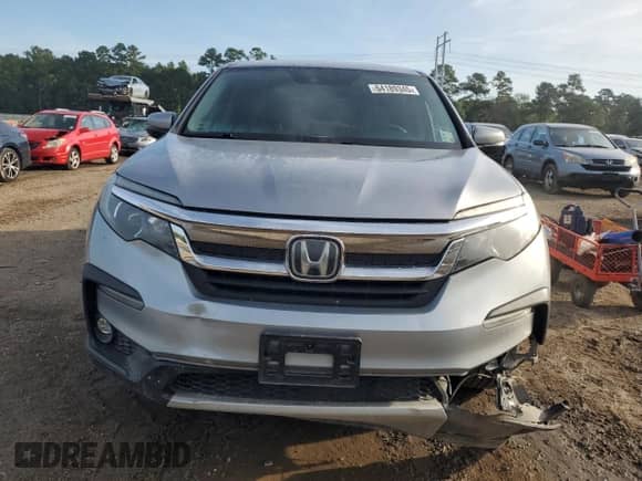 2020 Honda Pilot EX z VIN 5FNYF5H37LB027070, wystawiony jako Copart lot #64189345 z przebiegiem Nie podano mil oraz Szkoda całkowita • Salvage title. Historia ofert i sprzedaży dostępna na DreamBid. Obrazek 5.