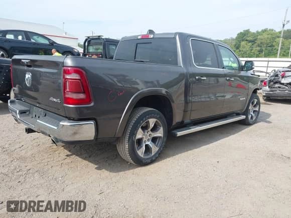 2021 Ram 1500 Laramie z VIN 1C6SRFJT3MN538900, wystawiony jako IAAI lot #42924937 z przebiegiem 28 946 mil mil oraz . Historia ofert i sprzedaży dostępna na DreamBid. Obrazek 4.