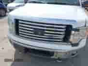 2012 Ford F-150 XL with VIN 1FTFW1ETXCFC46329, listed as a IAAI auction lot 43027270 with 153,168 mi miles and . Bid and sale history available at DreamBid. Image 6.