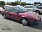 1995 Saturn SL with VIN 1G8ZH5286SZ149862, listed as a Copart auction lot 70059855 with 103,300 mi miles and Salvage title. Bid and sale history available at DreamBid. Image 4.