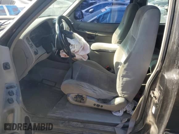 1998 Ford Explorer with VIN 1FMYU22E0WUD43223, listed as a Copart auction lot 64430825 with 180,159 mi miles and Salvage title. Bid and sale history available at DreamBid. Image 7.