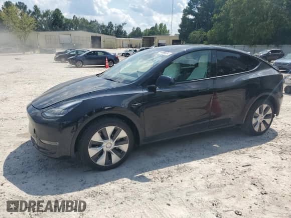 2022 Tesla Model Y Long Range with VIN 7SAYGDEE9NF455340, listed as a Copart auction lot 66966654 with 22,707 mi miles and Salvage title. Bid and sale history available at DreamBid. Image 1.