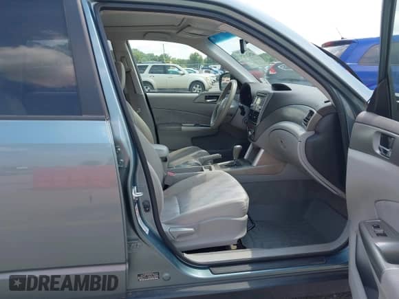 2009 Subaru Forester X with VIN JF2SH63609H766458, listed as a IAAI auction lot 42621929 with 152,235 mi miles and . Bid and sale history available at DreamBid. Image 5.