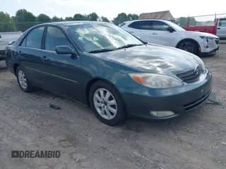 2003 Toyota Camry LE with VIN 4T1BF30KX3U557324, listed as a IAAI auction lot 42569029 with 115,266 mi miles and . Bid and sale history available at DreamBid. Image 1.
