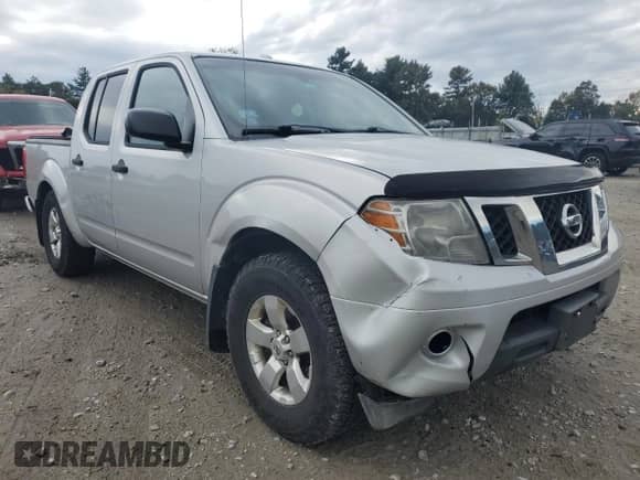 2012 Nissan Frontier SL with VIN 1N6AD0EV7CC410940, listed as a Copart auction lot 85820055 with 180,922 mi miles and Salvage title. Bid and sale history available at DreamBid. Image 4.