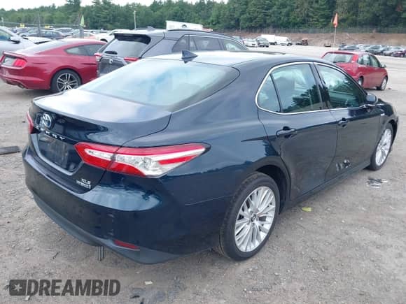 2020 Toyota Camry Hybrid XLE z VIN 4T1F31AK7LU521801, wystawiony jako IAAI lot #42707425 z przebiegiem 66 573 mil mil oraz . Historia ofert i sprzedaży dostępna na DreamBid. Obrazek 4.