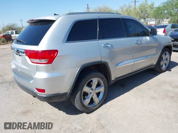 2012 Jeep Grand Cherokee Limited z VIN 1C4RJEBG9CC211082, wystawiony jako IAAI lot #42694437 z przebiegiem 149 205 mil mil oraz . Historia ofert i sprzedaży dostępna na DreamBid. Obrazek 4.