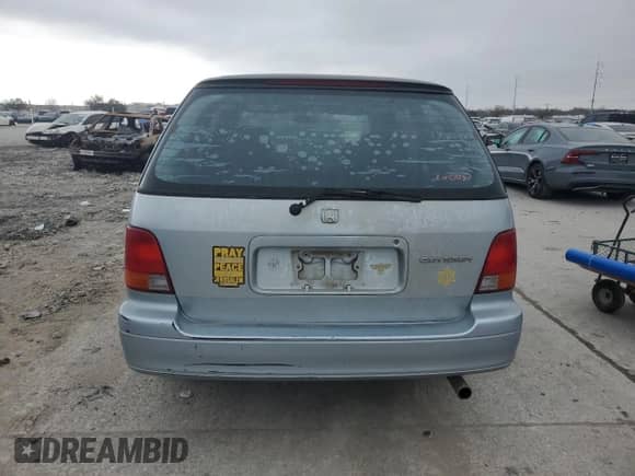1997 Honda Odyssey with VIN JHMRA184XVC008354, listed as a Copart auction lot 44390495 with 246,841 mi miles and Salvage title. Bid and sale history available at DreamBid. Image 6.