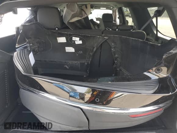 2024 Chevrolet Suburban LT with VIN 1GNSKCKD4RR116483, listed as a Copart auction lot 81288105 with 59,645 mi miles and Salvage title. Bid and sale history available at DreamBid. Image 13.