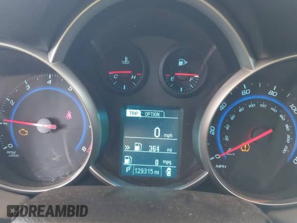 2016 Chevrolet Cruze LS z VIN 1G1PC5SH1G7221655, wystawiony jako IAAI lot #43140380 z przebiegiem 129 315 mil mil oraz . Historia ofert i sprzedaży dostępna na DreamBid. Obrazek 7.