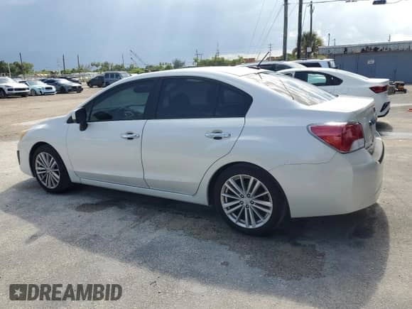 2013 Subaru Impreza Limited with VIN JF1GJAK6XDH023639, listed as a Copart auction lot 66723295 with 65,010 mi miles and Salvage title. Bid and sale history available at DreamBid. Image 2.