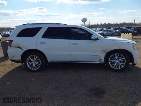 2015 Dodge Durango Citadel with VIN 1C4RDHEG8FC194428, listed as a IAAI auction lot 42029650 with 105,394 mi miles and . Bid and sale history available at DreamBid. Image 13.