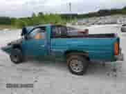 1995 Nissan Frontier z VIN 1N6SD11S4SC459520, wystawiony jako Copart lot #62758145 z przebiegiem Nie podano mil oraz Nie do naprawy • Non repairable. Historia ofert i sprzedaży dostępna na DreamBid. Obrazek 2.