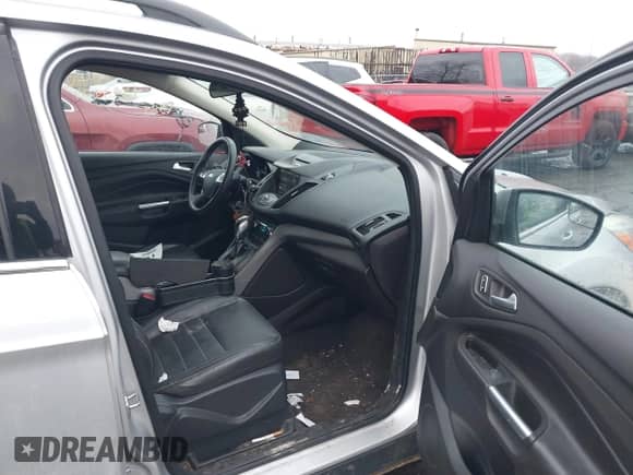 2014 Ford Escape SE with VIN 1FMCU0GX1EUD07872, listed as a IAAI auction lot 41189503 with 120,025 mi miles and . Bid and sale history available at DreamBid. Image 5.