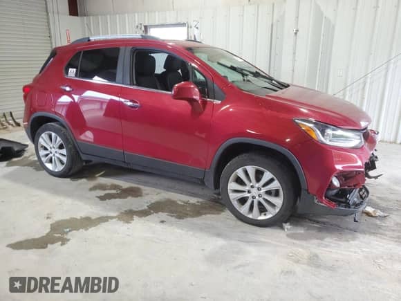 2020 Chevrolet Trax Premier with VIN 3GNCJRSB7LL218805, listed as a Copart auction lot 68977535 with 91,667 mi miles and Salvage title. Bid and sale history available at DreamBid. Image 4.