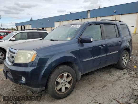 2009 Honda Pilot Touring с VIN 5FNYF48859B026241, выставлен на аукционе Copart как лот 86626395 с пробегом 277 038 миль миль и Чистый • Clean title. История ставок и продаж доступна на DreamBid. Изображение 1.