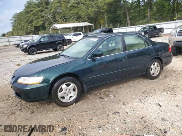 1999 Honda Accord EX with VIN 1HGCG1651XA064572, listed as a Copart auction lot 85878025 with 312,538 mi miles and Salvage title. Bid and sale history available at DreamBid. Image 1.