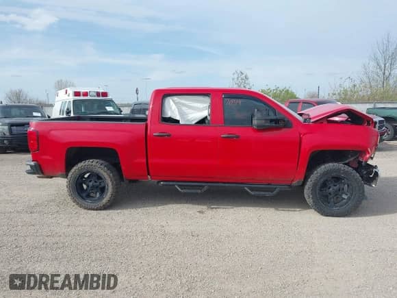 2014 Chevrolet Silverado 1500 LT z VIN 3GCUKREC2EG479477, wystawiony jako IAAI lot #41867034 z przebiegiem 159 893 mil mil oraz . Historia ofert i sprzedaży dostępna na DreamBid. Obrazek 14.