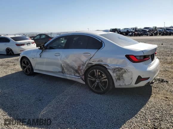2022 BMW 3 Series 330e with VIN 3MW5P7J03N8C52943, listed as a Copart auction lot 55048115 with 62,561 mi miles and Salvage title. Bid and sale history available at DreamBid. Image 2.