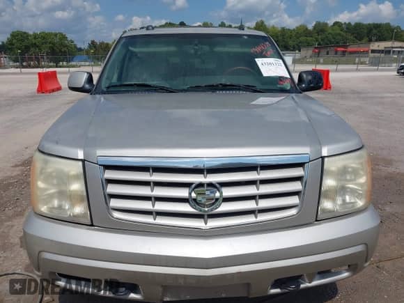 2005 Cadillac Escalade z VIN 1GYEK63N85R173272, wystawiony jako IAAI lot #43201322 z przebiegiem 274 700 mil mil oraz . Historia ofert i sprzedaży dostępna na DreamBid. Obrazek 6.