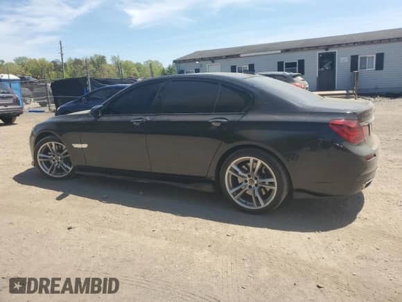 2014 BMW 7 Series 750i xDrive с VIN WBAYB6C52ED224536, выставлен на аукционе Copart как лот 54397595 с пробегом 107 410 миль миль и Списание • Salvage title. История ставок и продаж доступна на DreamBid. Изображение 2.