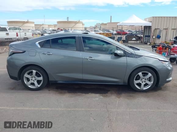 2017 Chevrolet Volt LT z VIN 1G1RA6S56HU119507, wystawiony jako IAAI lot #43145579 z przebiegiem 101 560 mil mil oraz . Historia ofert i sprzedaży dostępna na DreamBid. Obrazek 13.