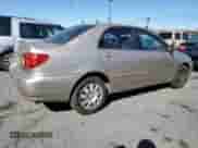2004 Toyota Corolla CE z VIN 1NXBR32E94Z301126, wystawiony jako Copart lot #87467835 z przebiegiem 181 189 mil mil oraz Szkoda całkowita • Salvage title. Historia ofert i sprzedaży dostępna na DreamBid. Obrazek 3.