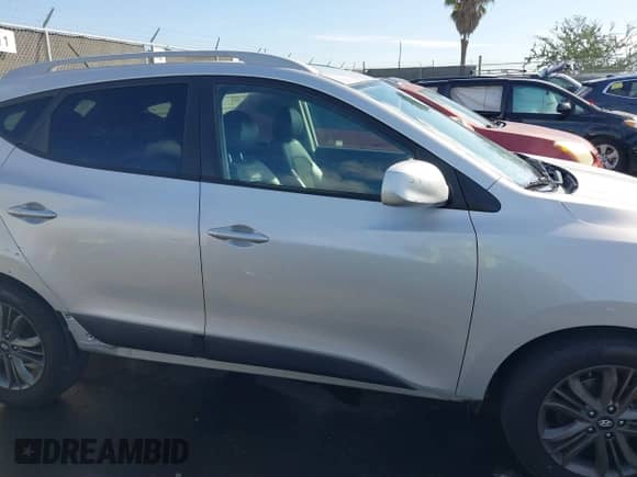 2015 Hyundai Tucson SE with VIN KM8JU3AG7FU963562, listed as a IAAI auction lot 41620894 with 171,382 mi miles and . Bid and sale history available at DreamBid. Image 14.
