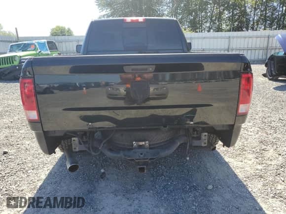 2014 Ram 1500 Express z VIN 3C6JR6AT0EG257501, wystawiony jako Copart lot #68586615 z przebiegiem 126 870 mil mil oraz Szkoda całkowita • Salvage title. Historia ofert i sprzedaży dostępna na DreamBid. Obrazek 6.