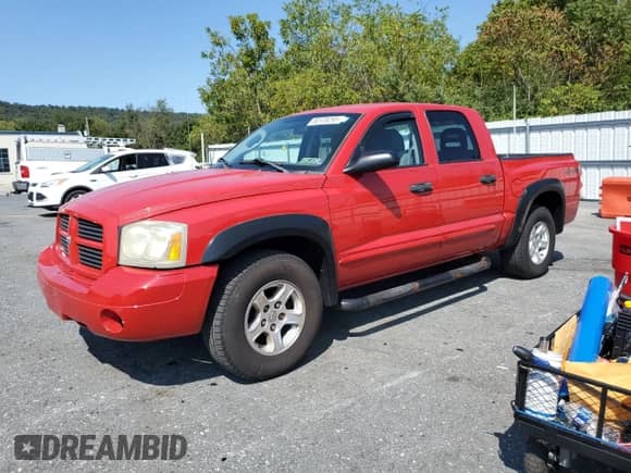 2006 Dodge Dakota SLT with VIN 1D7HW48N76S503312, listed as a Copart auction lot 80128295 with 179,802 mi miles and Salvage title. Bid and sale history available at DreamBid. Image 1.