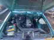 1997 Nissan Frontier XE z VIN 1N6SD16S9VC353030, wystawiony jako Copart lot #71554575 z przebiegiem 151 637 mil mil oraz Czysty tytuł • Clean title. Historia ofert i sprzedaży dostępna na DreamBid. Obrazek 7.