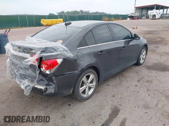 2015 Chevrolet Cruze LT with VIN 1G1PE5SB5F7159911, listed as a IAAI auction lot 42864558 with 110,037 mi miles and . Bid and sale history available at DreamBid. Image 4.