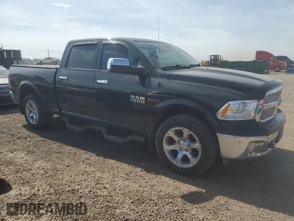 2014 Ram 1500 Laramie z VIN 1C6RR7VM8ES434901, wystawiony jako Copart lot #65967775 z przebiegiem 111 433 mil mil oraz Czysty tytuł • Clean title. Historia ofert i sprzedaży dostępna na DreamBid. Obrazek 4.